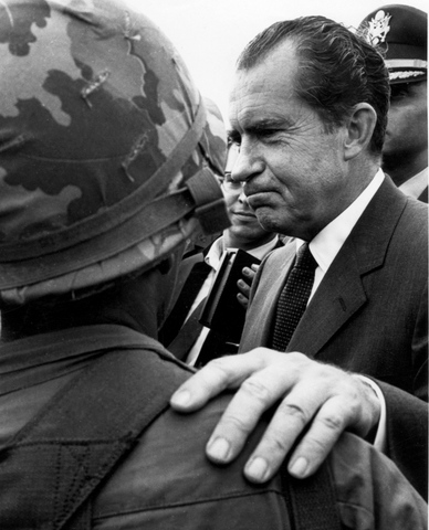 Nixon cuts troops