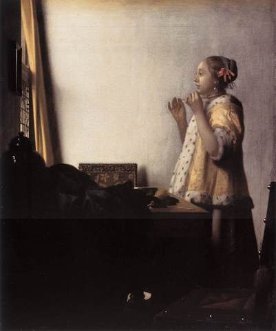 Women with a Pearl Necklace by Jan Vermeer