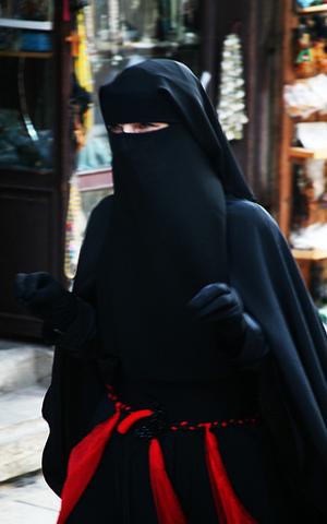 1936 Veiling of women in public is banned by the Shah.