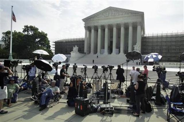 High Court Splits its Verdict on Arizona Immigration Law