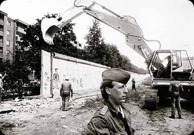 Berlin Wall is demolished.