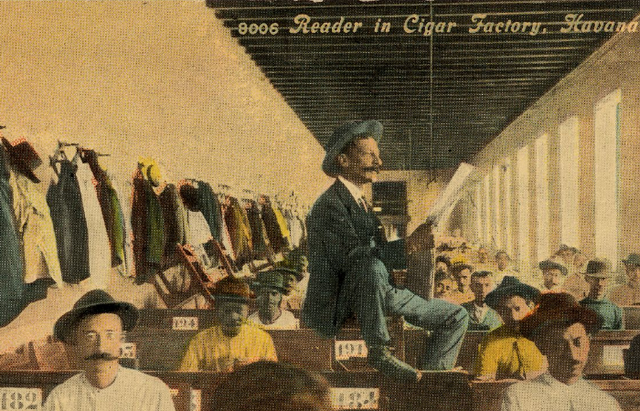 Begins working as a reader at a Cigar factory, learns spanish