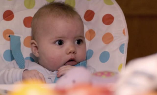 Puts objects to mouth with hand