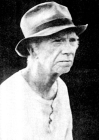 George and Lennie arrive at the ranch at meets Old Candy