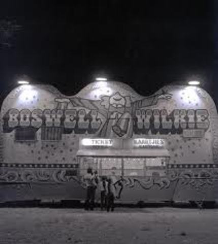 Judy runs away to 'Wilkies Circus' in town and meets a boy named Carl who lets her stay there and help him with his chores.