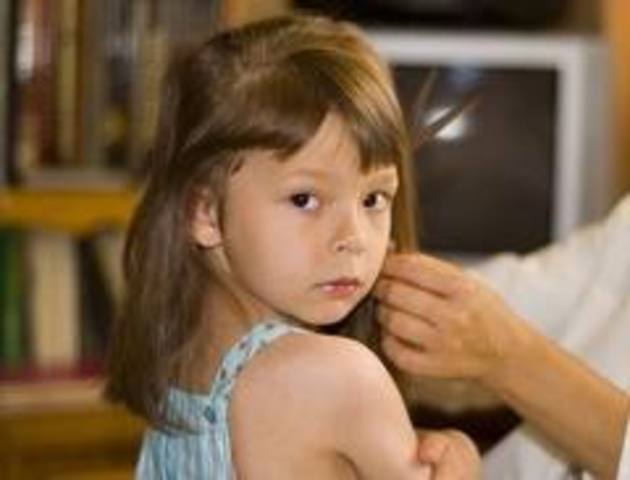 Freda cut Judy's hair to look like a boy in preparation for their trip to South Africa.