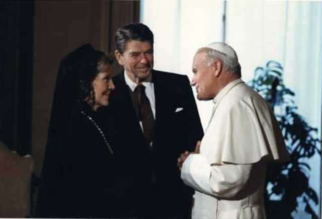 Pope meets Ronald Reagan.