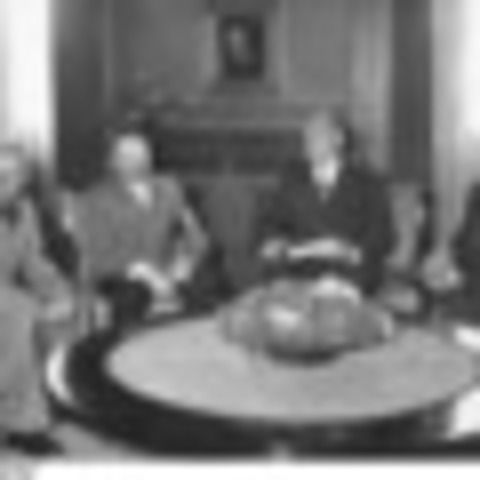 British Prime Minister Chamberlain appeases Hitler at Munich