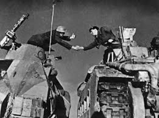 British and US forces defeat German and Italian armies in North Africa