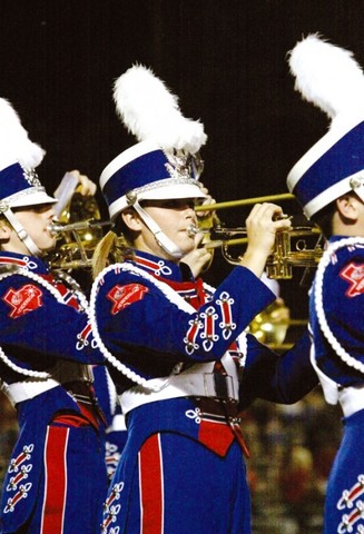 Participé desfilar banda competencia.