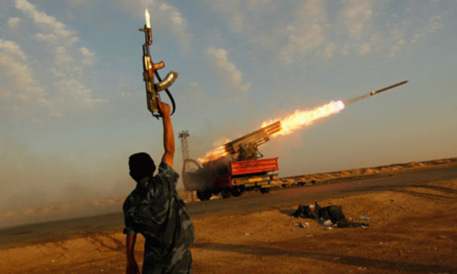 Libyan families flee Gaddafi forces in Ajdabiya as civilian death toll rises