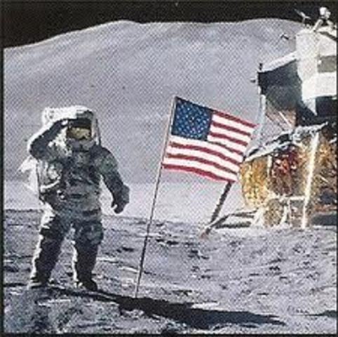 Neil Armstrong and Edwin "Buzz" Aldrin become the first men to walk on the Moon while crewmate Michael Collins orbits around the Moon alone.