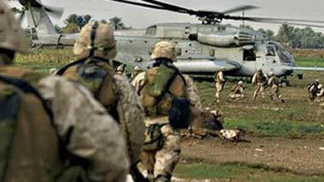 Iraqi troops surround US & other embassies in Kuwait City