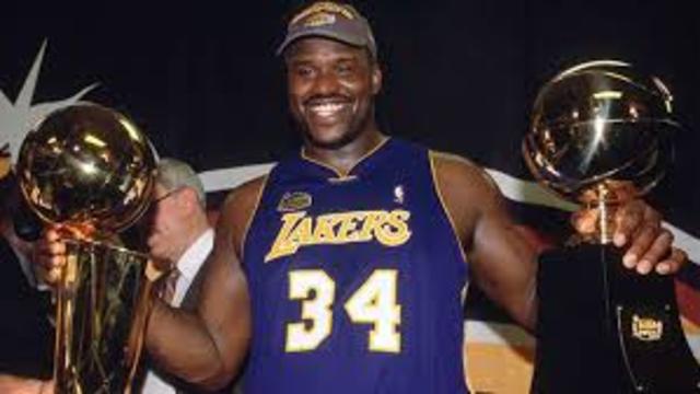 Shaq wins 2 NBA Finals and Finals MVP