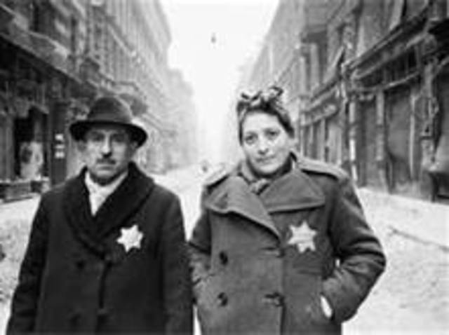 Yellow stars required to be worn by Polish Jews over age 10