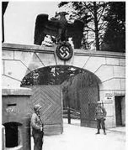 The Warsaw Ghetto, containing over 400,000 Jews, is sealed off