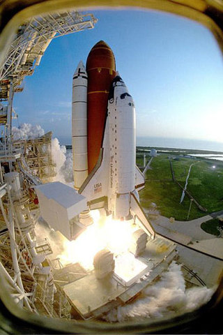 Space Shuttle Discovery lifts off for the third maintenance mission to the Hubble Space Telescope