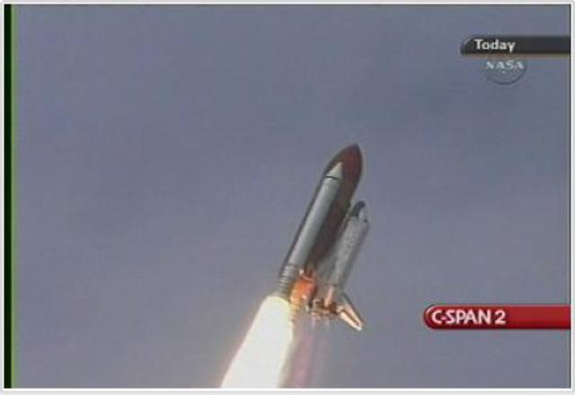 Space Shuttle Discovery is launched on a 14-day ISS construction mission