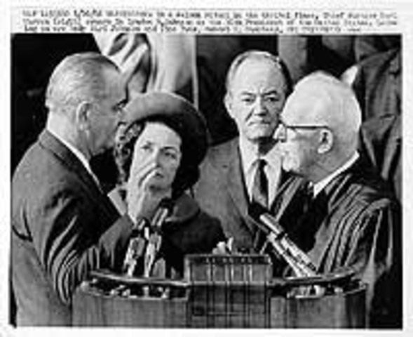Lyndon B. Johnson is sworn over for presidency.