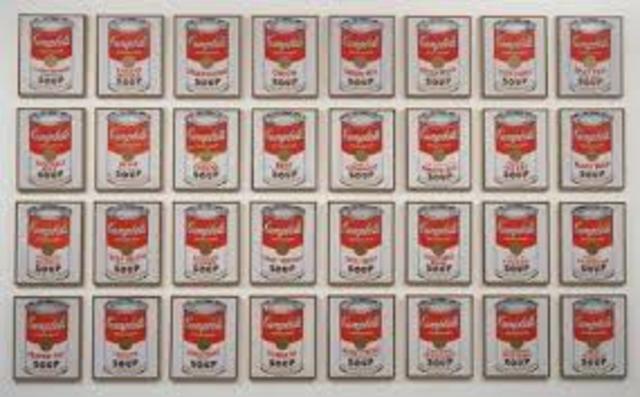 Andy Warhol exhibits his Campbell's Soup Cans