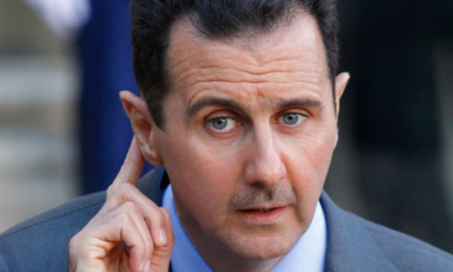 Syrian president fires his cabinet