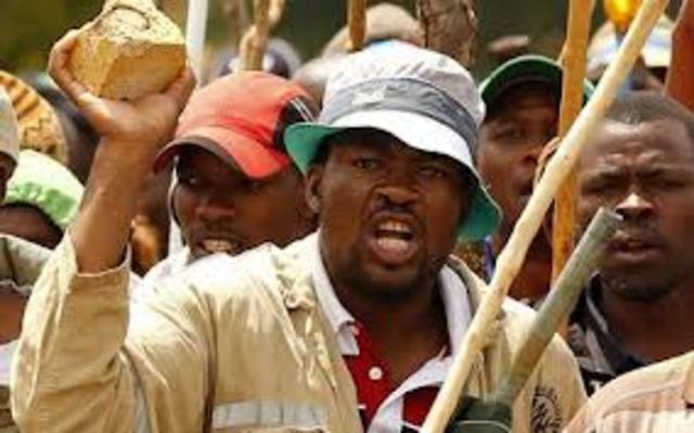 100,000 gold miners strike over pay bringing the industry to a standstill