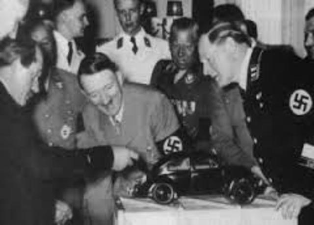 Hitler introduces Ferdinand Porsche's "Volkswagen"