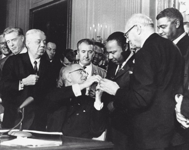 Civil Rights Act signed by President Lyndon Johnson