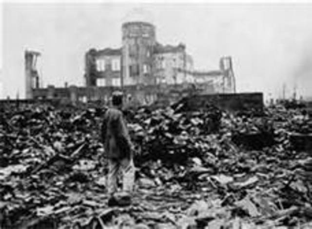 Atomic bomb drops on Nagasaki.