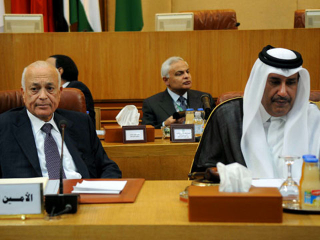 Syrian tanks shell Homs hours after Arab League peace deal