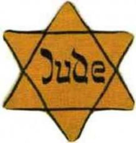 Jews are ordered, by December 1, to wear white armbands with a yellow Star of David, when in public.