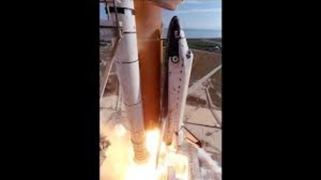 Shuttle Columbia dies in an explosion in space