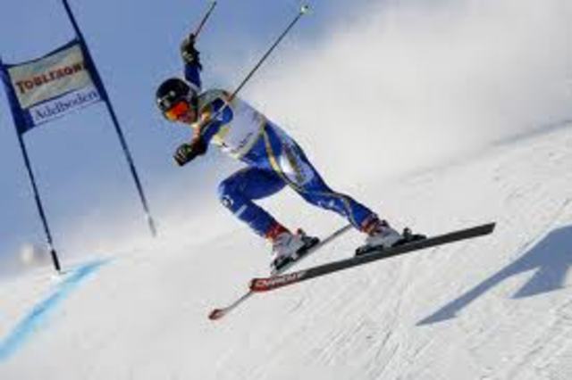 One-tenth of a second separated the men's downhill medalists