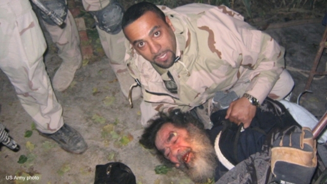 Saddam is captured by U.S. troops.