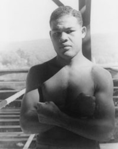 Joe Louis wins world heavyweight Boxing Championship in Chicago