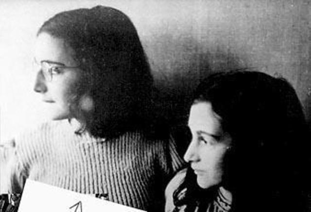 Anne Frank and her family are discovered and arrested
