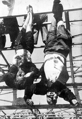 Mussolini is hanged by Italian partisans
