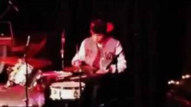 austin learns to play the drums