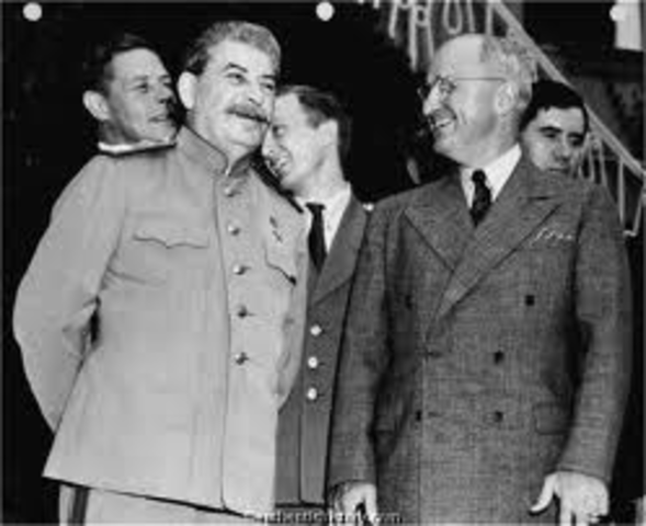 Harry S Truman and Soviet premier Joseph Stalin work together.