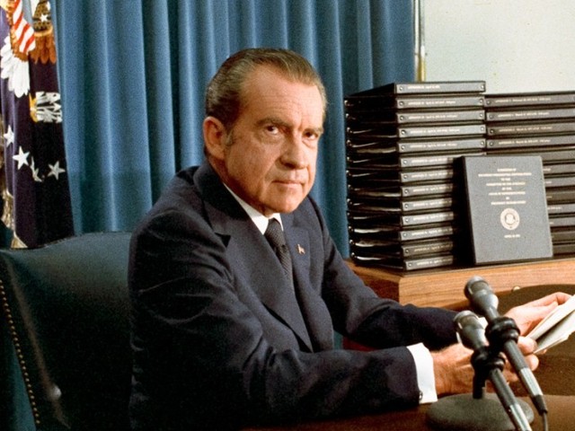 President Nixon agrees to hand over tapes to comply with subpoena.