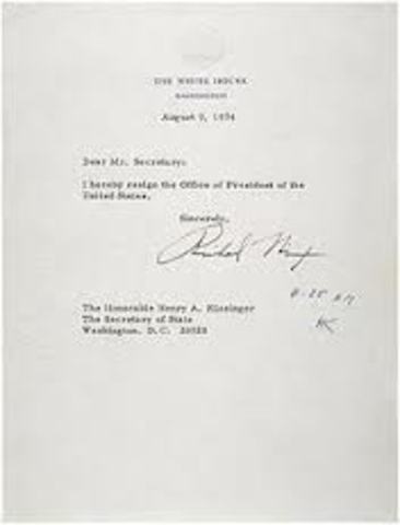 Nixon resigns.