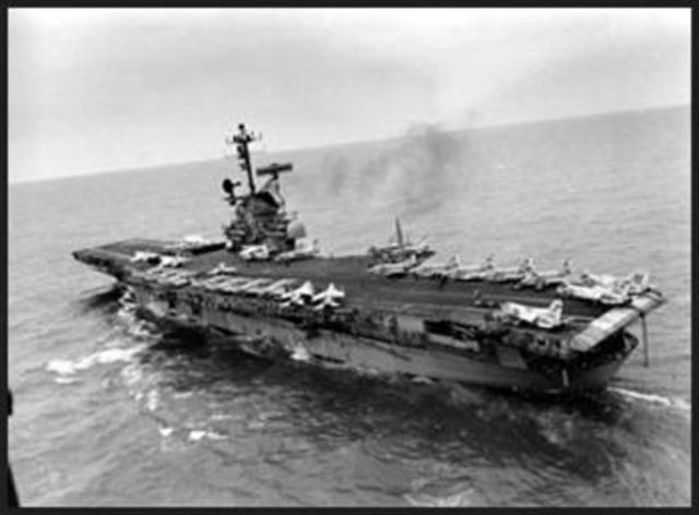 U.S. aircraft carrier "Core" arrives in Saigon with 33 helicopters and 400 air and ground crewmen assigned to operate them for S. Vietnam