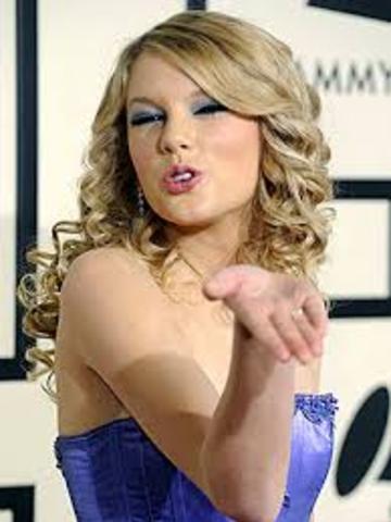 Taylor writes her first song at age 12