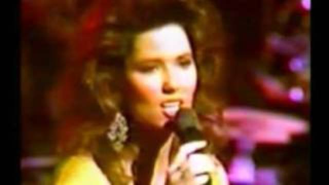 Shania Writes Her First Song..."Love Is A Rose"