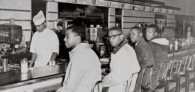 Four black students in Greensboro, North Carolina, begin a sit-in at a segregated Woolworth's lunch counter