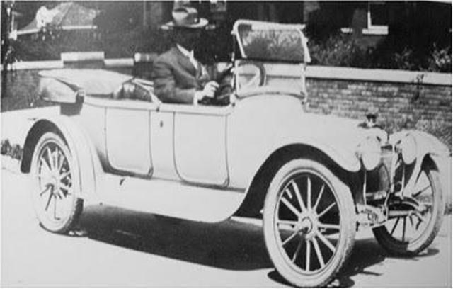 John ran to a farm house for help because his car burnt down.