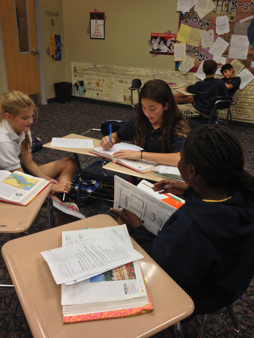 Group studying the Greeks