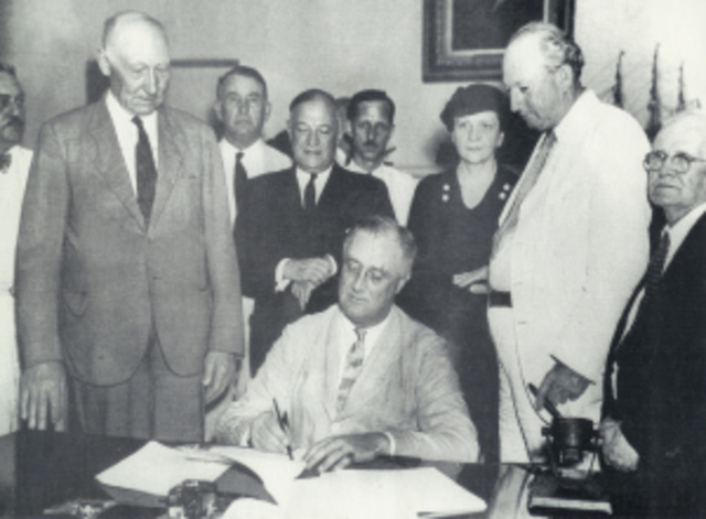President Roosevelt Signs the Social Security Act