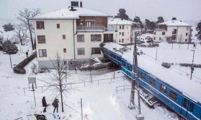 Cleaner injured after 'driving stolen train into building' in Stockholm