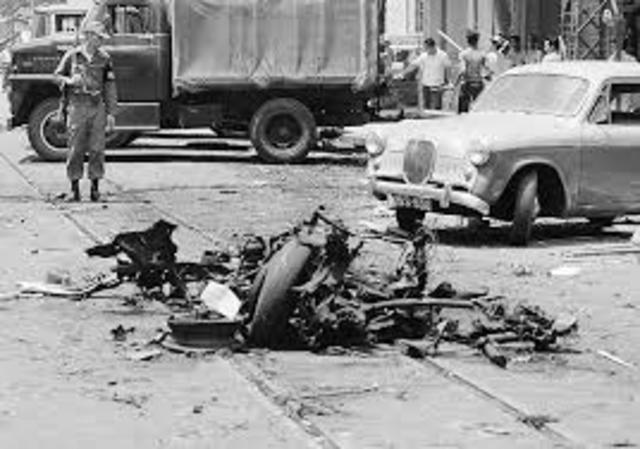 One of the American dead is carried to a waiting transport